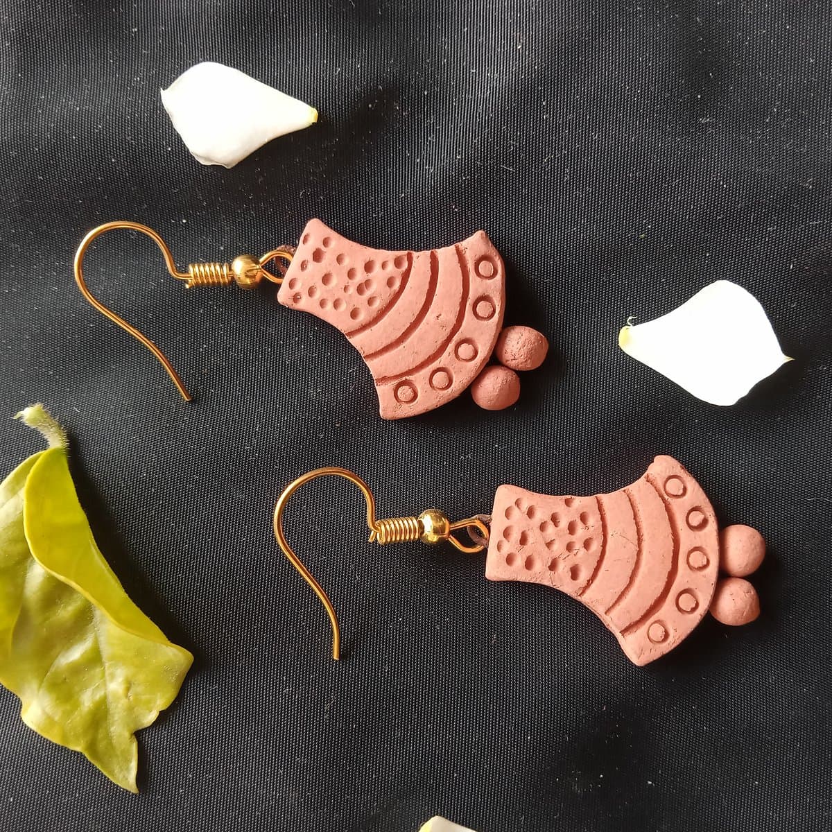 Flared temple bell terracotta earrings