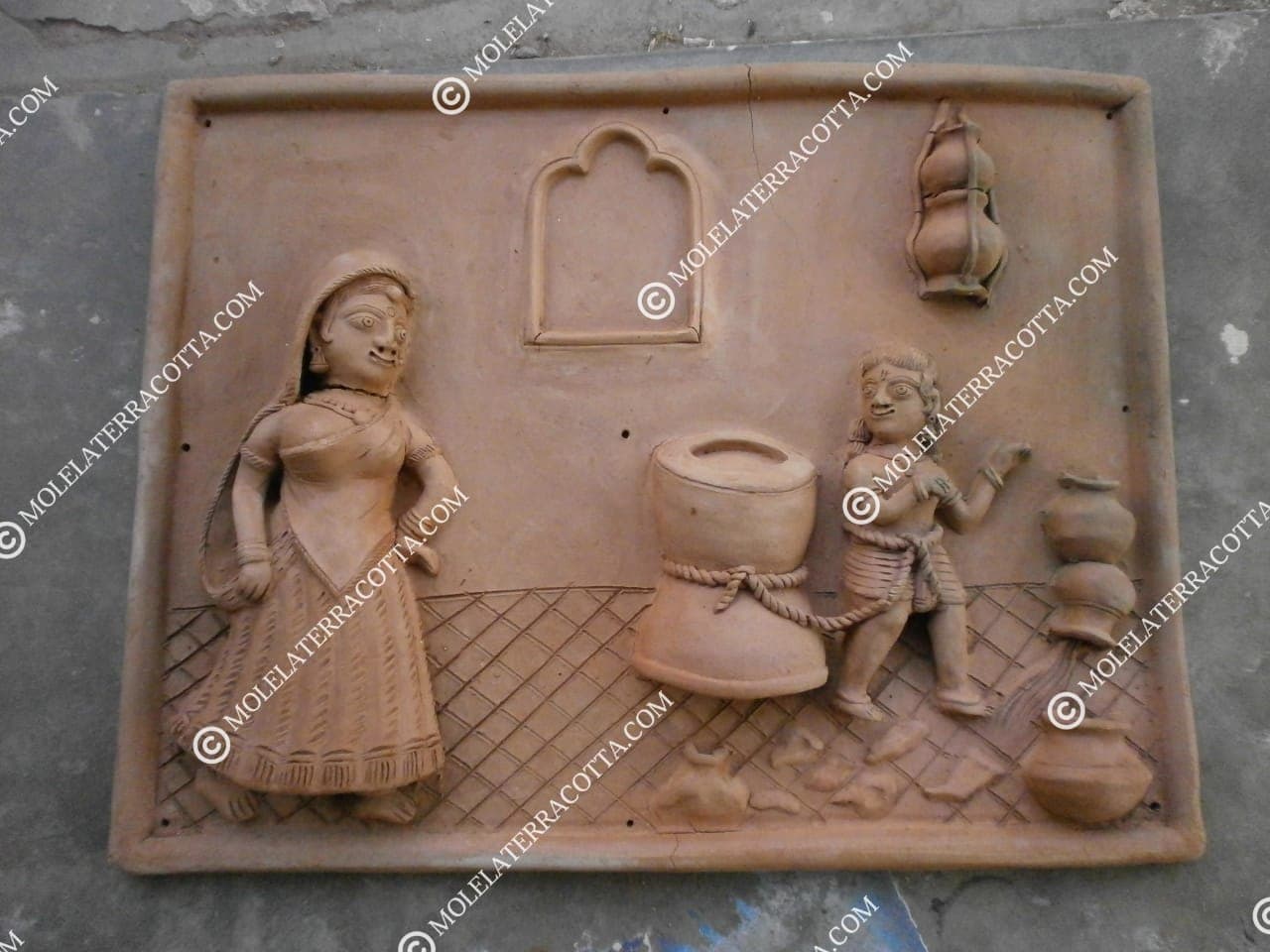 Hand-carved Molela terracotta panel depicting Ukhal Bandhan with Yashoda and Krishna